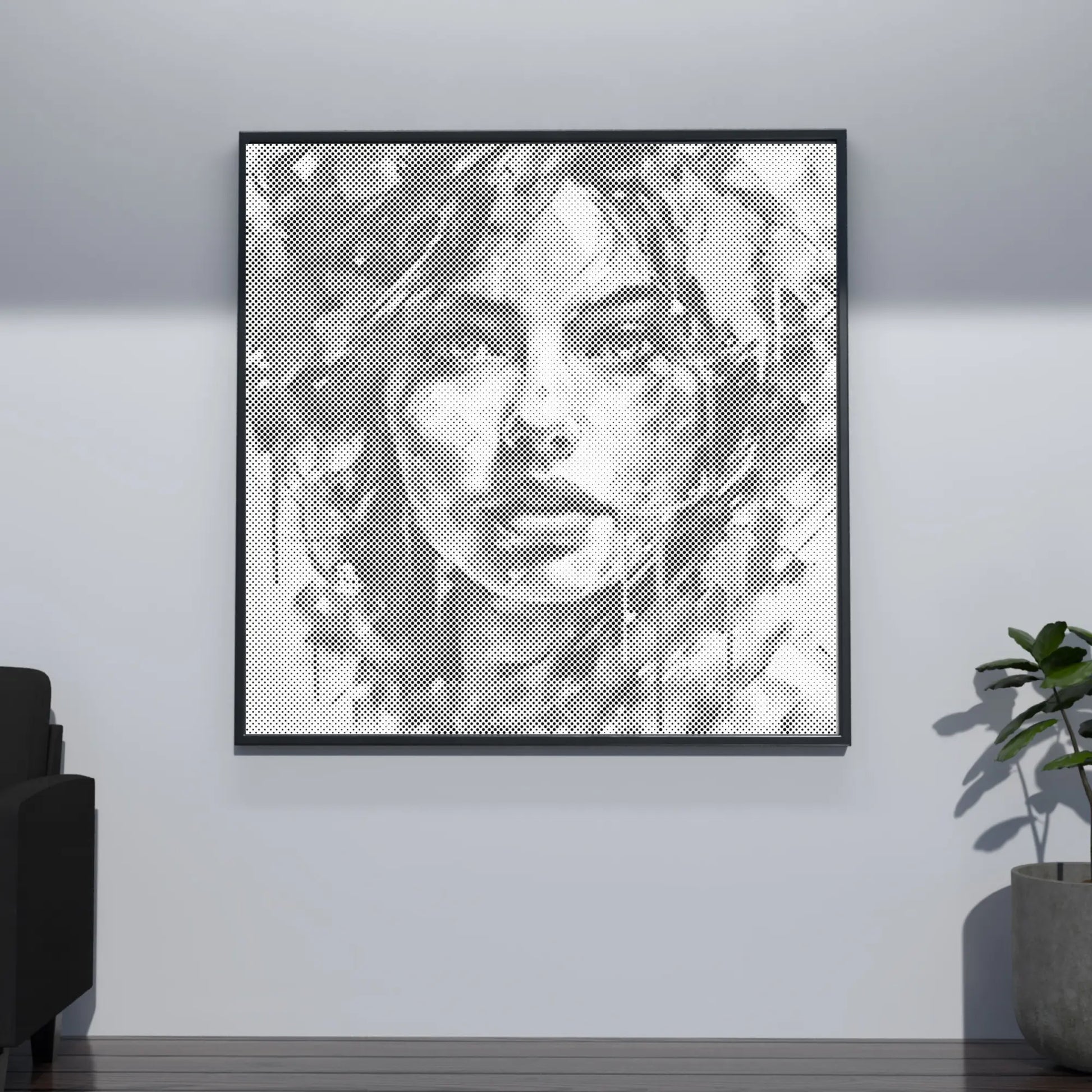 Framed black and white portrait art on a wall in a room with a plant and sofa. Modern Woman Portrait | Dot Painting Kit