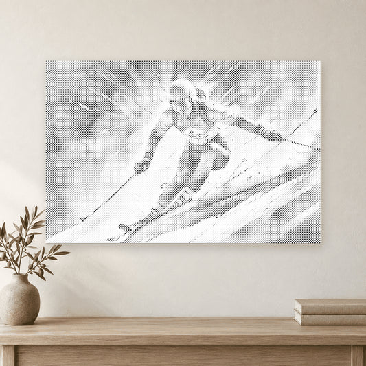 Alpine skier dot-painting canvas displayed on an ivory wall above a pale oak console.