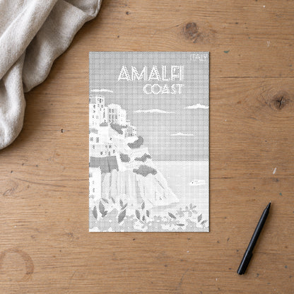 Dot-painting canvas “Amalfi Coast”, seen from above on a worktable in soft daylight.
