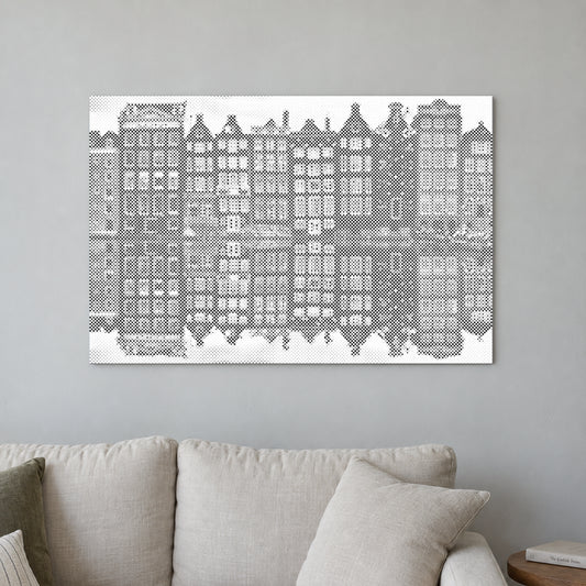 Dot-painting canvas “Amsterdam Houses”, displayed on a light wall in a softly lit room.