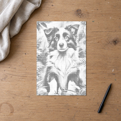 Dot-painting canvas “Border Collie Puppy”, seen from above on a worktable in soft daylight.