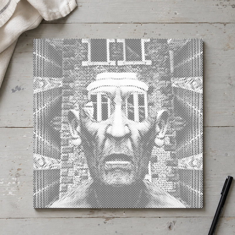Dot-painting canvas “Fearsome Man”, seen from above on a worktable in soft daylight.