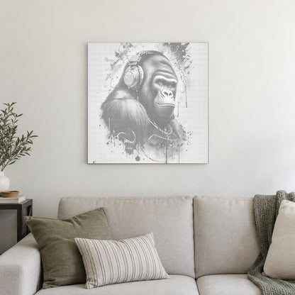 Dot-painting canvas “Gorilla with Headphones”, displayed on a light wall in a softly lit room.