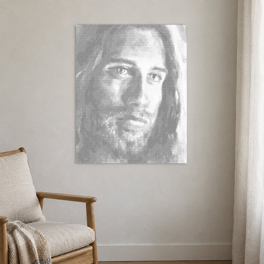 Dot-painting canvas “Jesus Christ”, displayed on a light wall in a softly lit room.