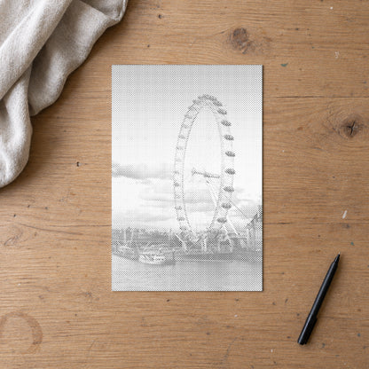 Dot-painting canvas “London Eye”, seen from above on a worktable in soft daylight.