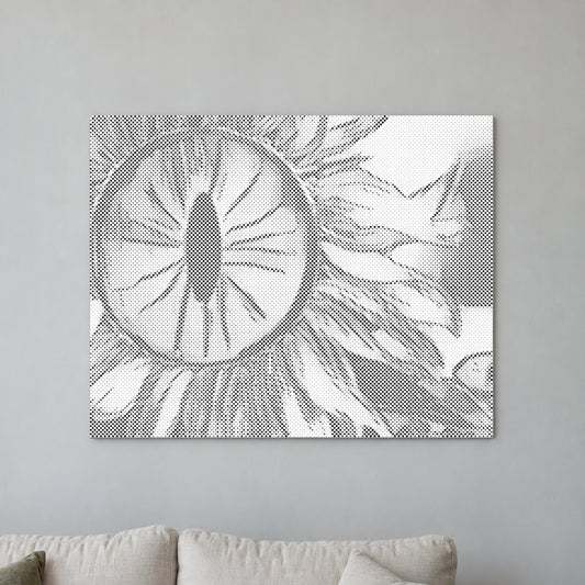 Dot-painting canvas “Sunflower Eye”, displayed on a light wall in a softly lit room.